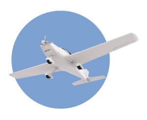 weißes Segelflugzeug vor blauem Kreis